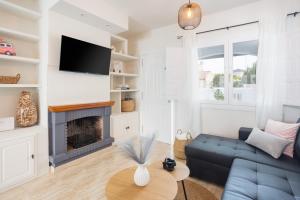 Et tv og/eller underholdning på Mediterranean Breeze Beach House