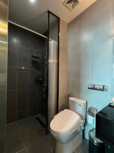 Ένα μπάνιο στο Uberzen Residence Hotel