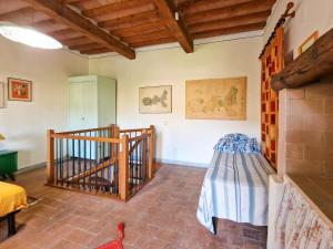 En eller flere senge i et værelse på Casa Belladonna Rio Marina