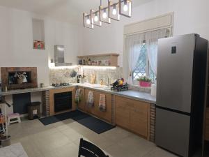 Kuchyň nebo kuchyňský kout v ubytování Villa Luxury Etna House + 20 fotografií