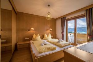 Ένα ή περισσότερα κρεβάτια σε δωμάτιο στο Ferienwohnung Mölten