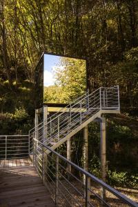 a mirror on top of a wooden bridge at Spino Fiorito Stay in Casola in Lunigiana +61 photos