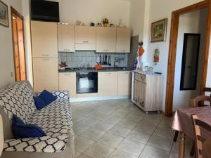 Kuchyň nebo kuchyňský kout v ubytování Casa vacanza Monica