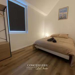 Postel nebo postele na pokoji v ubytování L'impasse