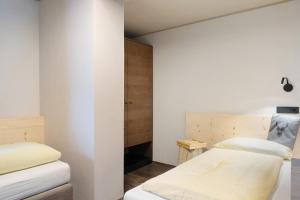 Postel nebo postele na pokoji v ubytování Angerle Alm Apt Similde A