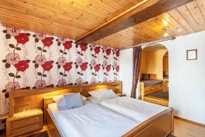 Postel nebo postele na pokoji v ubytování Gästehaus Gross