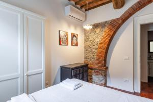 Katil atau katil-katil dalam bilik di Casa Laudomia +16 gambar