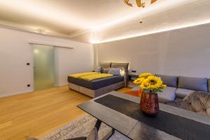 a living room with a couch and a table at Gh Alte Post - Top 3 Manta in Gmünd in Kärnten