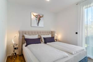 Postel nebo postele na pokoji v ubytování Purer Genuss - Exklusive