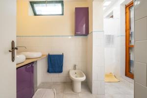 Et badeværelse på Casa Serenella + 17 billeder