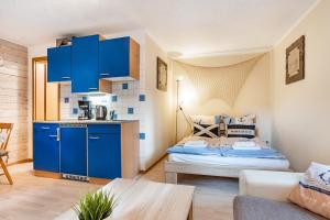 Η κουζίνα ή μικρή κουζίνα στο Bungalow zum Leuchturm, Bgl 20