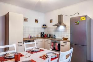 Kuchyň nebo kuchyňský kout v ubytování Ferienhaus am Wald