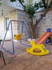 Ο χώρος παιχνιδιού για παιδιά στο Apartments Lanmari