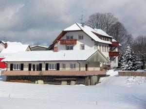 a house with snow on top of it at Fewo Siglinde Schneider in Freiamt