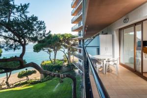 a balcony with a view of the ocean at Cavall Bernat in Platja  d'Aro