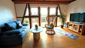 TV a/nebo společenská místnost v ubytování Ferienwohnung Uschi