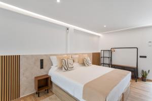 Ένα ή περισσότερα κρεβάτια σε δωμάτιο στο Odi Suite Room