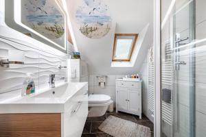 Koupelna v ubytování Haus Küstenliebe + 27 fotografií