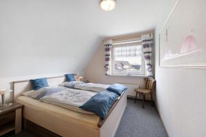 Postel nebo postele na pokoji v ubytování Haus Sünnschien