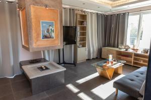 TV a/nebo společenská místnost v ubytování Michele Studio + 19 fotografií