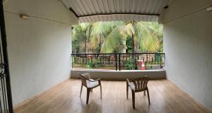 Balkón nebo terasa v ubytování Peaceful Bungalow with Private Garden