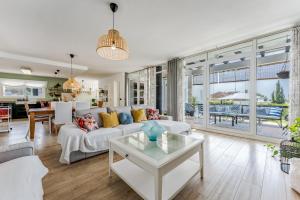a living room with a couch and a table at Villa Sueños in Mijas