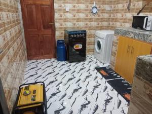 Kuchyň nebo kuchyňský kout v ubytování Metropolitan Manor Apartments