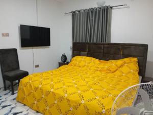 Postel nebo postele na pokoji v ubytování Metropolitan Manor Apartments + 8 fotografií