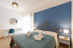 Postel nebo postele na pokoji v ubytování Capitan Trinchetto Risacca