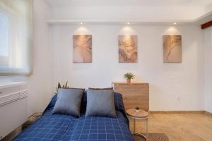 Ένα ή περισσότερα κρεβάτια σε δωμάτιο στο Apartamento Carlos Haya