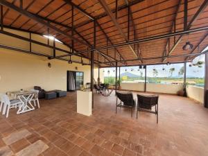 Balkón nebo terasa v ubytování Elysian Hideaway By StayJade3BHKPoolGardenLawn