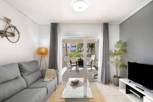 TV a/nebo společenská místnost v ubytování Breeze Island