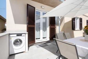 Φωτογραφία από το άλμπουμ του Appartamento 4 σε Fiumaretta di Ameglia