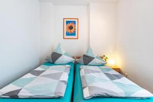 Postel nebo postele na pokoji v ubytování Ferienwohnung Am Bach