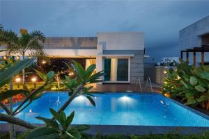 Πισίνα στο ή κοντά στο The Blue Orchard by StayJadeGardenPrivate Pool