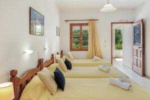 Ένα ή περισσότερα κρεβάτια σε δωμάτιο στο Studios Asterias 4