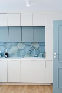 Nhà bếp/bếp nhỏ tại Apartamenty Nad Drwęcą