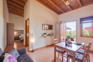 a living room with a couch and a table at Casa Quemahierro 2 in Icod de los Vinos