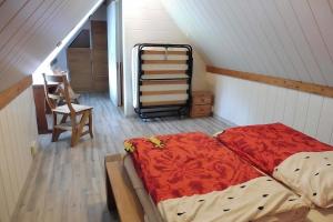 Ένα ή περισσότερα κρεβάτια σε δωμάτιο στο Unser Froschhaus