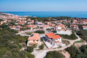 an aerial view of a villa in a resort at Casa con vista mare e monti in Cala Gonone