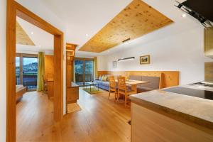 Ένα ή περισσότερα κρεβάτια σε δωμάτιο στο Thalerhof Appartement Christoph