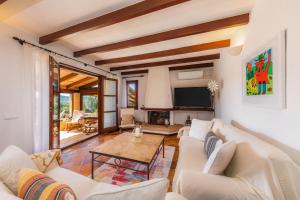 TV a/nebo společenská místnost v ubytování Can Nofre