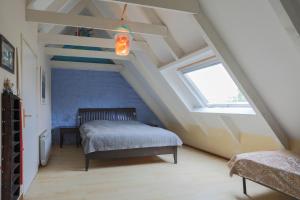 Ένα ή περισσότερα κρεβάτια σε δωμάτιο στο Gite La Grange 6 personnes