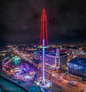 a view of the eiffel tower at night at Thornhill Blackpool in Blackpool +8 photos