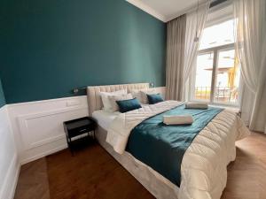 Ένα ή περισσότερα κρεβάτια σε δωμάτιο στο Luxury Dream Bestern