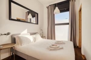 Postel nebo postele na pokoji v ubytování Peaceful Loft - Rho Fieramilano