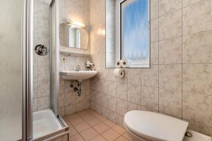 Koupelna v ubytování Apt Sellablick + 25 fotografií