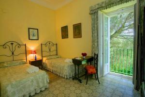 Ένα ή περισσότερα κρεβάτια σε δωμάτιο στο Hacienda La Parrilla Alta by Vintage Travel