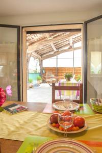 a table with a plate of food on top of it at Le gîte de Gemma in Montain