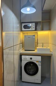 Кухня или мини-кухня в 利園賓館
